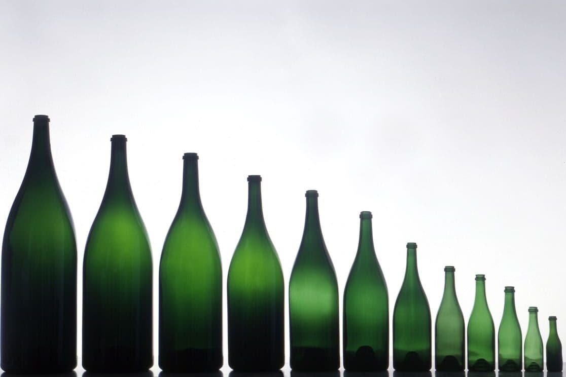 Wine bottles: why do they come in different shapes, with concave bottoms and various closures?